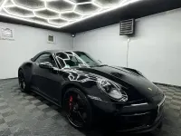 Second-hand Porsche 911 480 CP (353 kW) 2024 Negru Cabrio