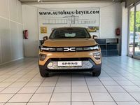 Gebraucht Dacia Spring Extreme 47 kW (65 PS) 2024 Beige Kleinwagen