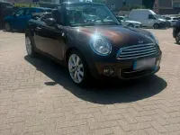 Gebraucht Mini Cooper Cabriolet 122 PS (89 kW) 2011 Braun Cabrio