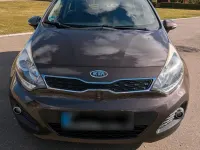 Używany Kia Rio 109 KM (80 kW) 2012 Brązowy Hatchback