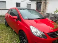 Usata Opel Corsa 101 CV (74 kW) 2011 Rosso Utilitaria