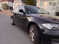 Gebraucht BMW 116 122 PS (89 kW) 2009 Schwarz Kleinwagen