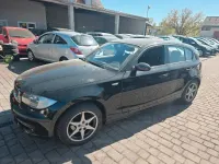 Second-hand BMW 116 122 CP (89 kW) 2008 Negru Hatchback