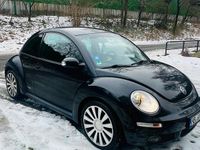 Gebraucht VW New Beetle 102 PS (75 kW) 2010 Schwarz Kleinwagen