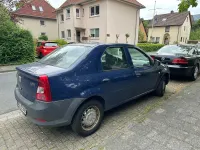Używany Dacia Logan 75 KM (55 kW) 2009 Purpurowy Sedan/Limuzyna