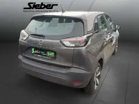 Gebraucht Opel Crossland Enjoy 131 PS (96 kW) 2023 Mondstein grau/e:vulkan grau SUV