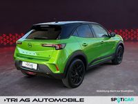 Gebraucht Opel Mokka-e 100 kW (136 PS) 2023 Ikone grün (metallic) (metallic) SUV
