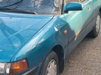 Gebraucht Mazda 323 75 PS (55 kW) 1994 Grün Kleinwagen
