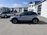 Gebraucht Opel Mokka-e Elegance 100 kW (136 PS) 2024 Kontrast grau SUV