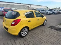 Gebraucht Opel Corsa 65 PS (47 kW) 2014 Gelb Kleinwagen