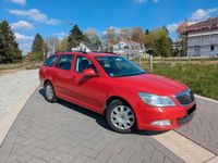 Second-hand Skoda Octavia Ambition 105 CP (77 kW) 2013 Roșu Break