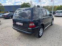 Second-hand Mercedes ML320 218 CP (160 kW) 2000 Negru SUV