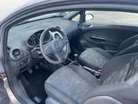 Używany Opel Corsa 69 KM (50 kW) 2012 Brązowy Hatchback