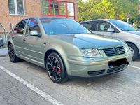 Second-hand VW Bora 110 CP (80 kW) 2003 Verde Berlinǎ