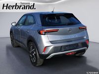 Gebraucht Opel Mokka-e Elegance 100 kW (136 PS) 2022 Kontrast grau/quarz silber SUV