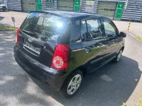 Gebraucht Kia Picanto Attract 65 PS (47 kW) 2010 Schwarz Kleinwagen