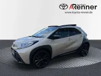 Gebraucht Toyota Aygo X Style 72 PS (52 kW) 2022 Ginger beige metallic/ night sky black SUV
