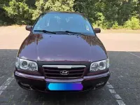 Gebraucht Hyundai Trajet GLS 140 PS (102 kW) 2006 Rot Van / Kleinbus