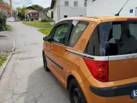 Gebraucht Peugeot 1007 88 PS (64 kW) 2006 Orange Van / Kleinbus