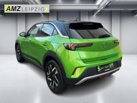 Gebraucht Opel Mokka Elegance 131 PS (96 kW) 2022 Matcha green/ikone gruen SUV