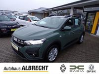 Gebraucht Dacia Sandero Expression 91 PS (66 kW) 2024 Safari grüngrau Kleinwagen