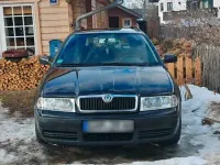 Używany Skoda Octavia 110 KM (80 kW) 2004 Czarny Kombi