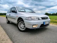 Gebraucht Mazda 323 73 PS (53 kW) 1998 Grau Kleinwagen