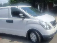 Gebraucht Hyundai H-1 170 PS (125 kW) 2014 Weiß Van / Kleinbus
