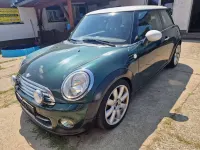Gebraucht Mini Cooper D 111 PS (81 kW) 2011 British racing green metallic Kleinwagen
