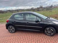 Gebraucht Peugeot 207 95 PS (69 kW) 2011 Schwarz Kleinwagen