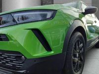 Gebraucht Opel Mokka-e 100 kW (136 PS) 2023 Matcha green/ikone gruen SUV