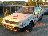 Gebraucht Mitsubishi Lancer 70 PS (51 kW) 1988 Weiß Limousine