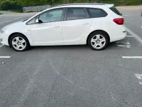 Używany Opel Astra Design Edition 101 KM (74 kW) 2011 Biały Kombi