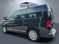 Second-hand VW Multivan Highline 179 CP (131 kW) 2010 Negru Monovolum