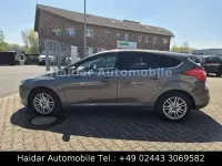 Używany Ford Focus Titanium 125 KM (91 kW) 2014 Brązowy Sedan/Limuzyna