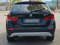 Second-hand BMW X1 204 CP (150 kW) 2011 Negru SUV