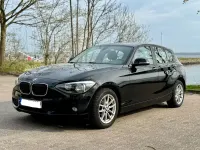 Second-hand BMW 114 102 CP (75 kW) 2014 Negru Hatchback