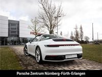 Gebraucht Porsche 992 450 PS (330 kW) 2020 Carraraweißmetallic Coupé