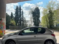 Gebraucht Peugeot 206+ 75 PS (55 kW) 2010 Silber Kleinwagen