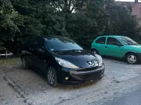 Gebraucht Peugeot 206+ 75 PS (55 kW) 2009 Schwarz Kleinwagen