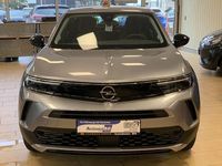 Gebraucht Opel Mokka-e Edition 100 kW (136 PS) 2023 Grau kontrast grau/quarz silber (metallic) SUV