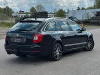 Używany Skoda Superb Elegance 170 KM (125 kW) 2010 Czarny Kombi