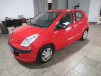 Gebraucht Nissan Pixo Acenta 68 PS (50 kW) 2010 Rot Kleinwagen
