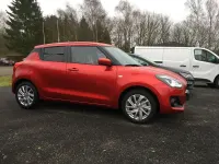 Gebraucht Suzuki Swift Comfort 83 PS (61 kW) 2023 Burning red pearl metallic Kleinwagen
