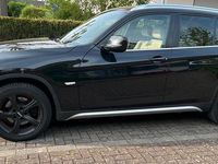 Używany BMW X1 204 KM (150 kW) 2011 Czarny SUV