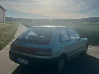 Gebraucht Mazda 323 73 PS (53 kW) 1991 Blau Kleinwagen