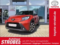 Neu Toyota Aygo X 72 PS (52 kW) 2025 Chili red perleffekt/dach myst SUV