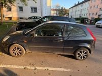 Używany Ford Fiesta 60 KM (44 kW) 2004 Niebieski Hatchback