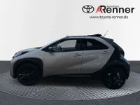 Gebraucht Toyota Aygo X Style 72 PS (52 kW) 2022 Ginger beige metallic/ night sky black SUV