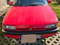Gebraucht Mazda 323 90 PS (66 kW) 1989 Rot Limousine